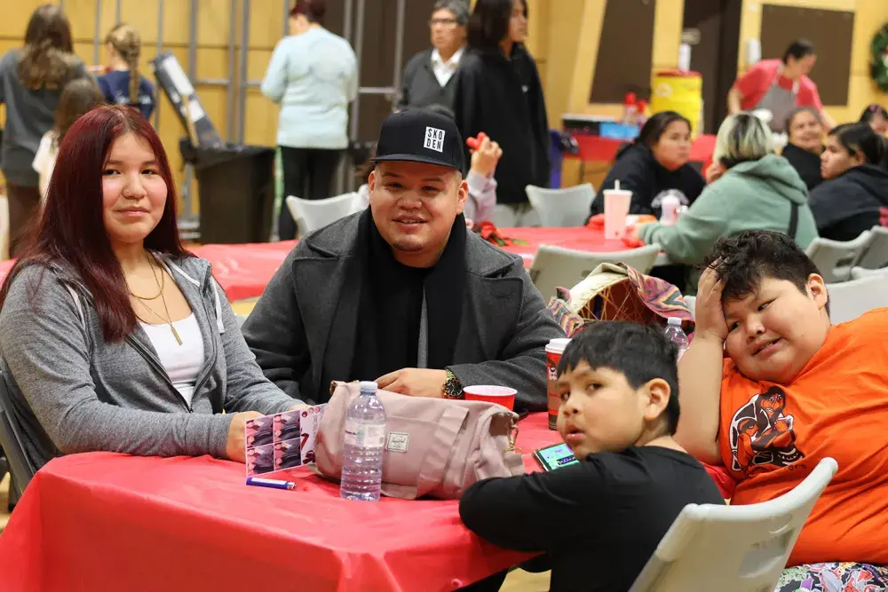 Ka:'yu:'k't'h'/Che:k'tles7et'h' First Nations’ Brandon Smith (centre) sits with family.
