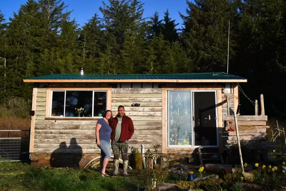 Marcie Callewaert and Lennie John pose for a photo in front of their home on Vargas Island. (Marcie Callewaert photos) 