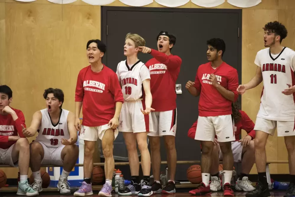 Players on the Alberni District Secondary School Armada senior boys' basketball team react to a play on first night of the 66th annual Totem Tournament, at ADSS in Port Alberni, on March 10, 2022.