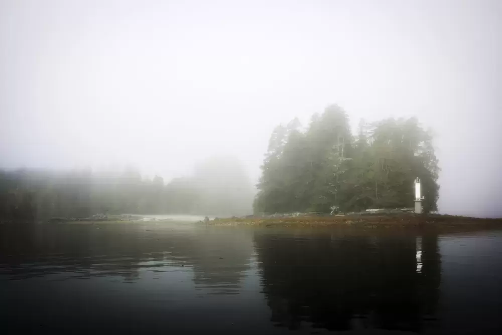 Hand Island is covered in fog as the Tseshaht Beach Keepers arrived in the morning to account for travellers, in the Broken Group Islands, in Barkley Sound, on July 26, 2021.