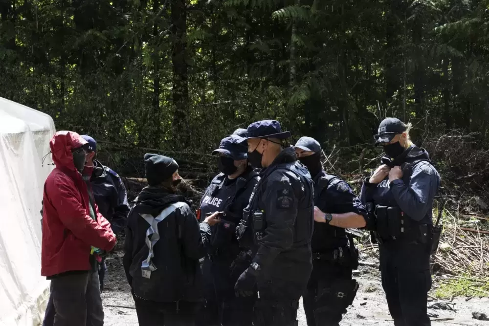 Police respond to queries about an arrest of man who identified himself as an independent journalist, at the Caycuse blockade in the Fair Creek watershed, near Port Renfrew, on May 19, 2021.