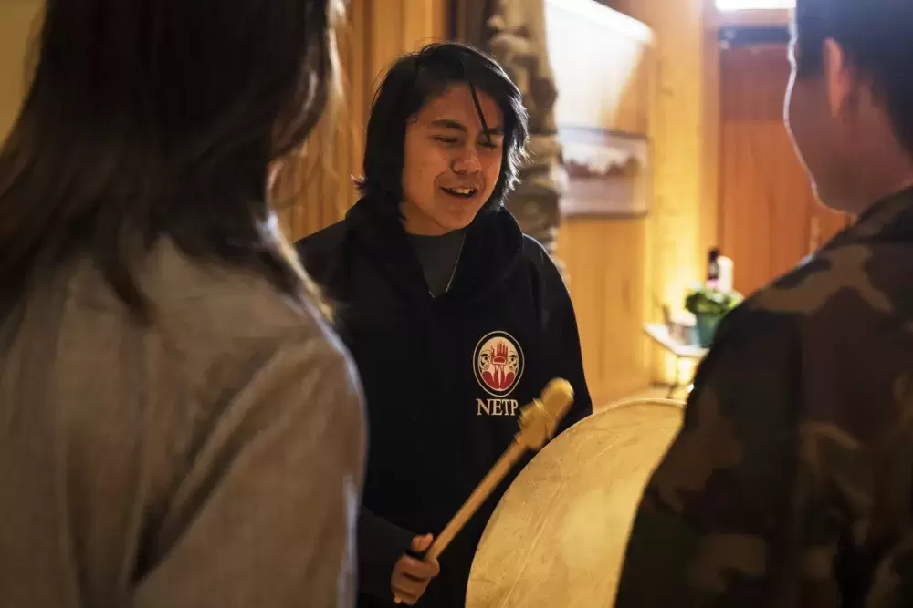 Youth from the Ehattesaht First Nation sing and drum during the NTC Northern Region Youth Gathering at the House of Unity, in Tsa'xana, near Gold River, on March 29, 2022.