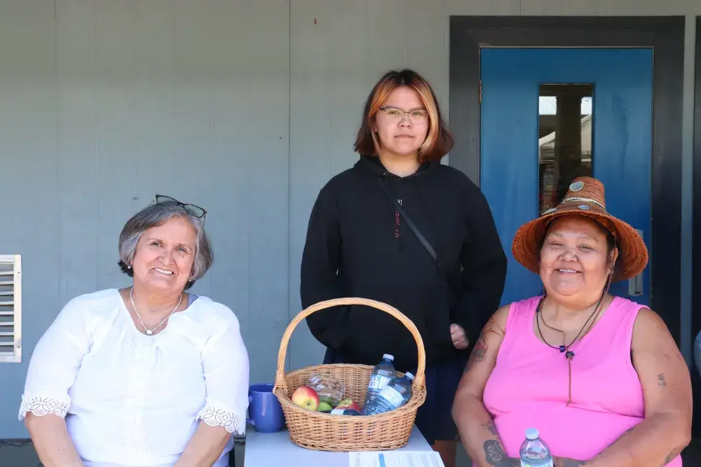 Angie Miller, Casey Sam and Rene Little at E.J. Dunn school on June 21. (Alexandra Mehl photo)