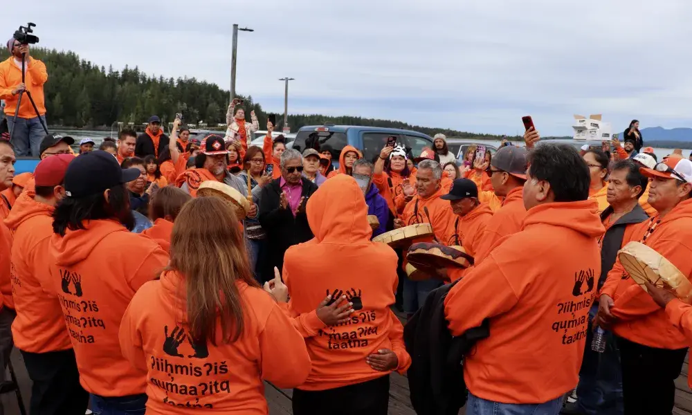 Tla-o-qui-aht family members come together to heal on the National Day for Truth and Reconciliation. 