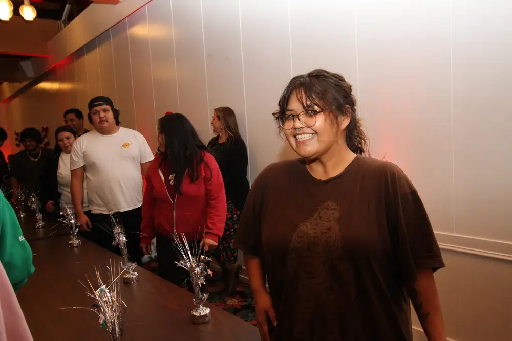 People of all ages played a games involving circling a table, then grabbing a silver object to get a prize when the music stopped.