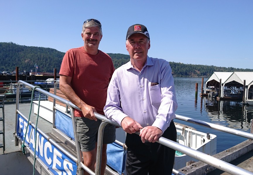 Mike Surrell, left, current owner of Lady Rose Marine Services, met Tuesday with future owner Greg Willmon. (Mike Youds photo)