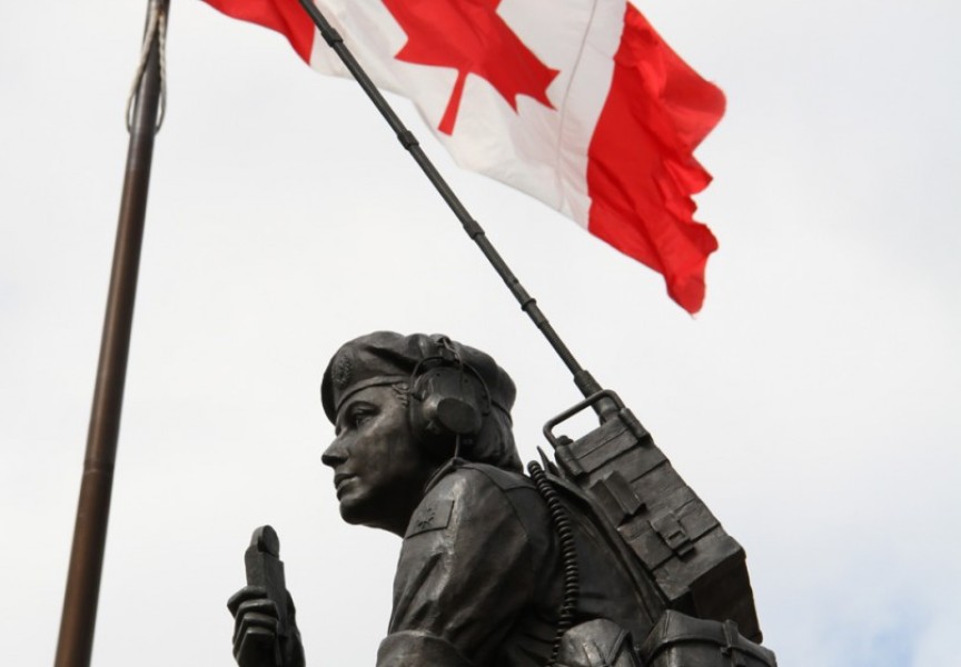 The Canadian flag flies over the Peacekeeping Memorial in Ottawa. (Ken Banks/Wikimedia Commons photo)