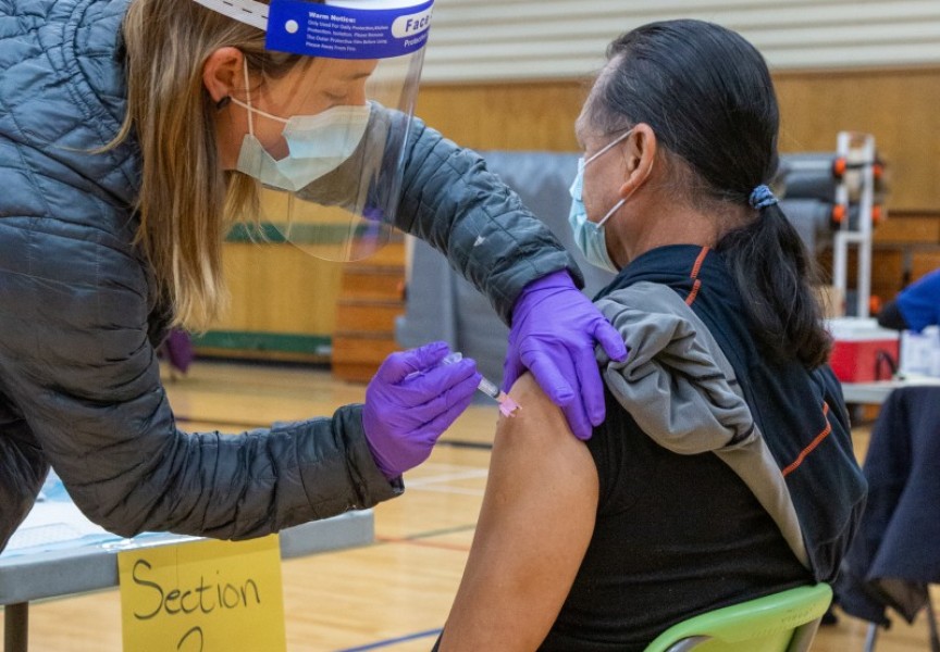 Ahousaht Chief Councillor Greg Louie receives the Moderna vaccine on Jan. 6, part of widespread distribution in the community. (Courtenay Louie photo) 