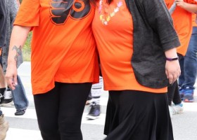 Maria Gomez and Kelly Johnson take part in the walk to commemorate Orange Shirt Day