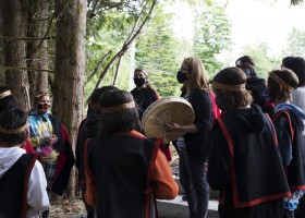 Helen Lucas (centre) and her Grade 5/6 class at Haahuupayak Elementary School sing together before the blessing ceremony of the school's new outdoor learning space, on June 11, 2021.